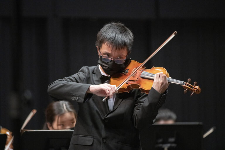 Joseph Wong playing the violin