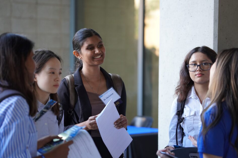 Four female students talking with a female recruiter