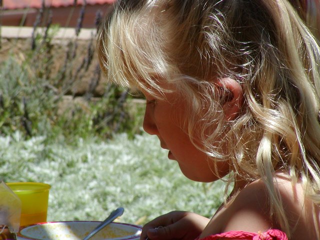 Sara eating soup
